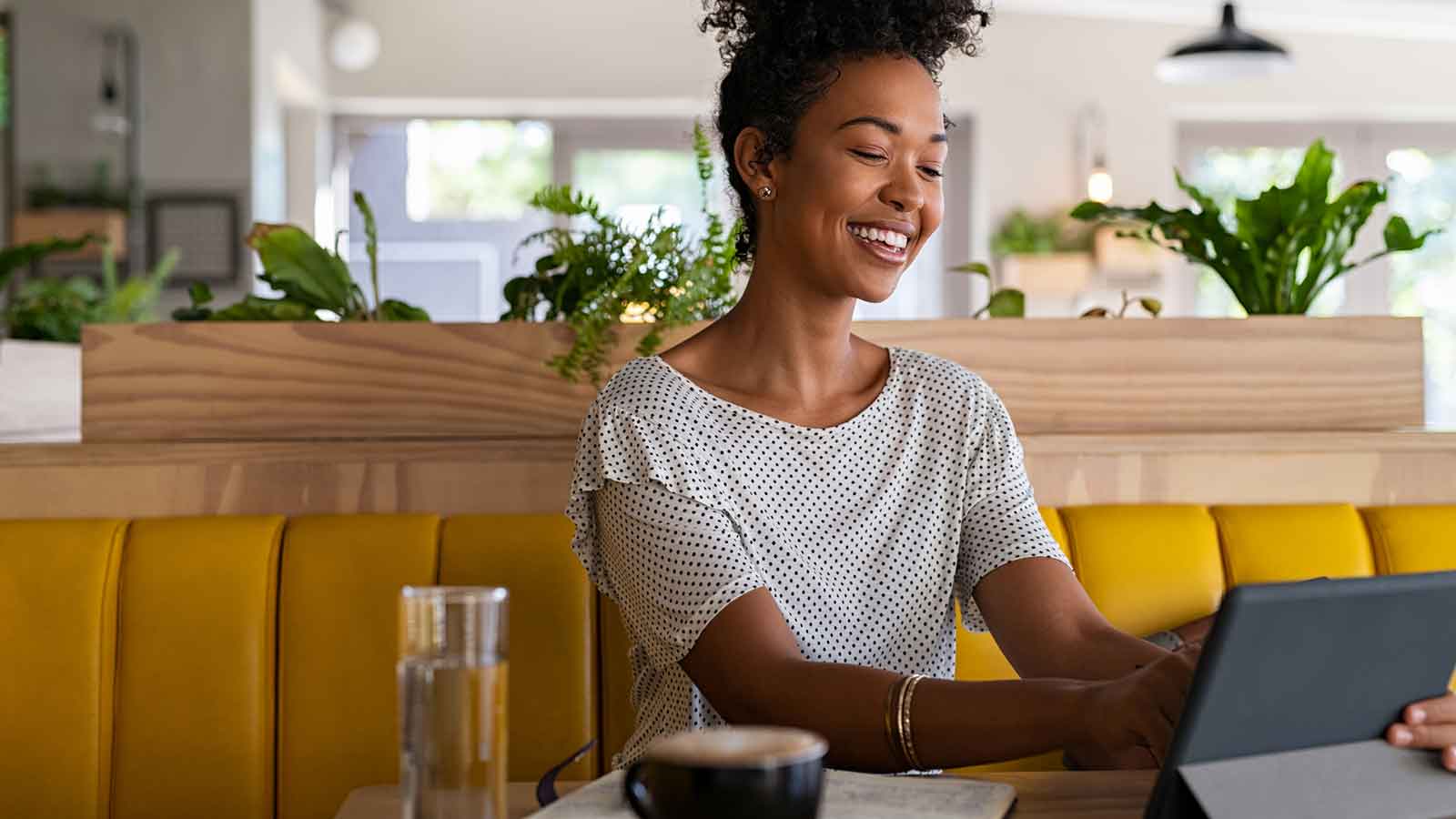Woman working in cafe
