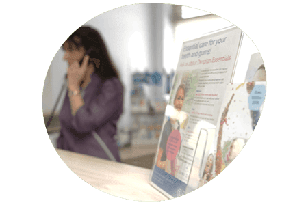 Dental practice receptionist and marketing materials